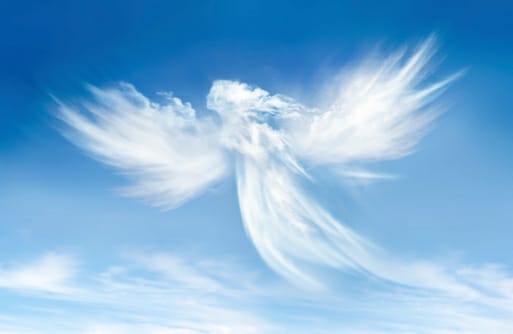 An image of an angel looking figure in the sky